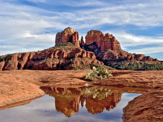 Reflections of Cathedral Rock on a rainwater pool
