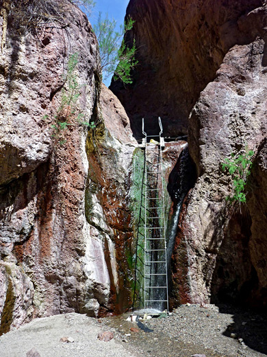 Ladder and waterfall, leading to the hot pools
