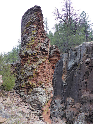 Narrow pillar of fractured basalt
