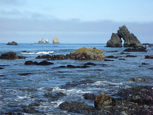 Sea arch, along the coastline south of the trail