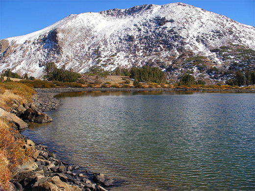 Summit Lake, beneath the snowy north side of Mt Lewis