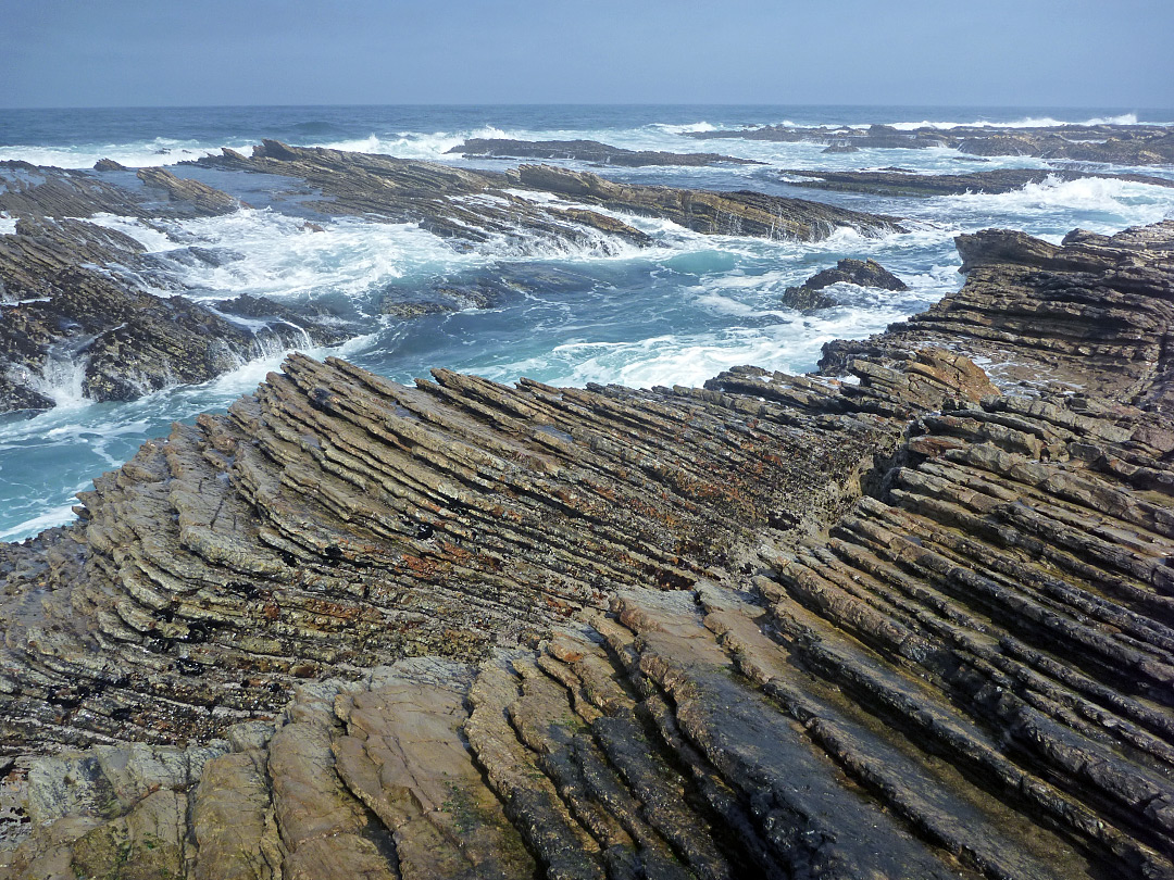 Curving, thin-layered rocks