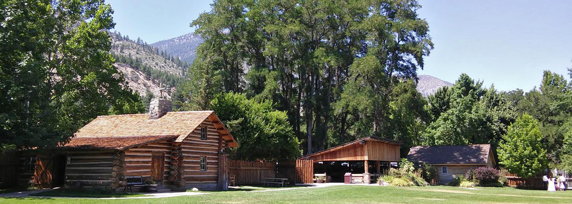 Lawn and wooden buildings at Mormon Station