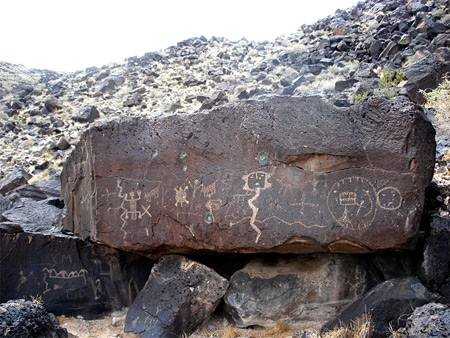 Boulder with many petroglyphs
