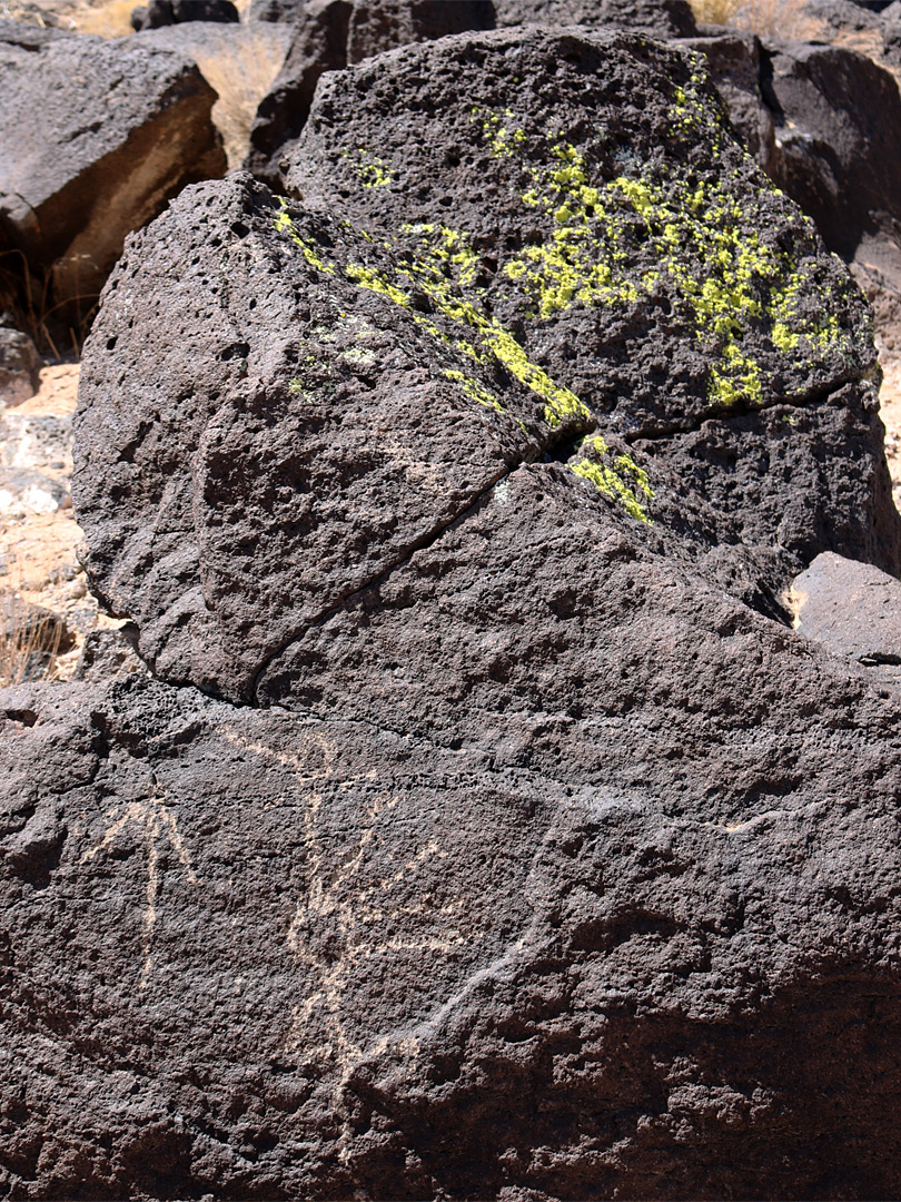 Petroglyph and green lichen