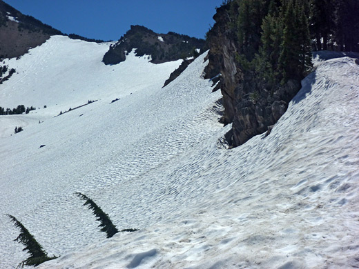 Deep snow in the cirque beneath the west face of Mt Scott