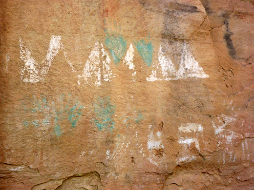 Green and white pictographs near Monarch Cave Ruin