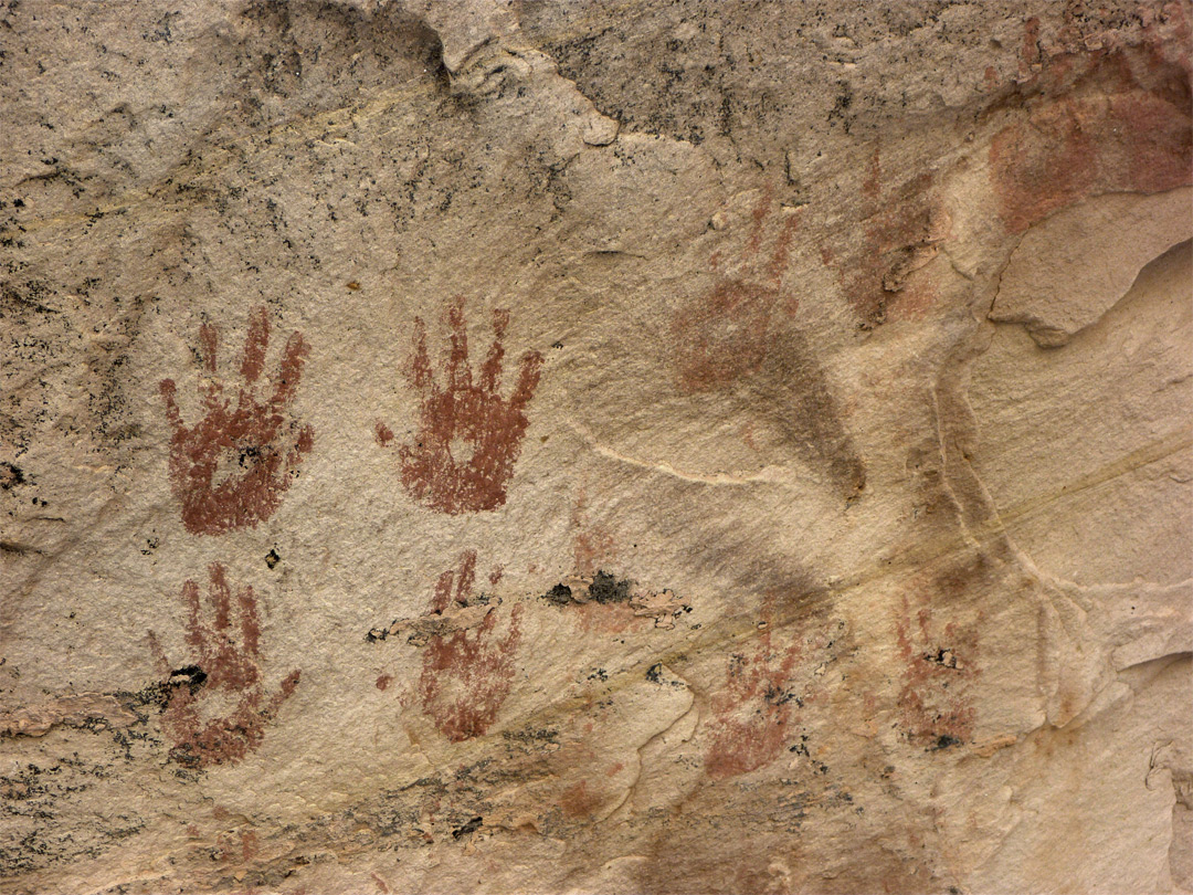 Red handprint pictographs