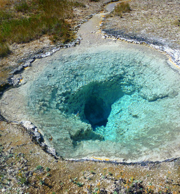 Turquoise water in a small hot spring