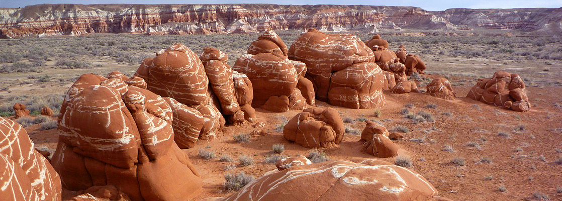 Rounded red boulders with white cross-banding