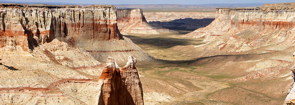 Undulating land and an isolated pillar, in the middle of Coal Mine Canyon