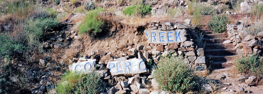 Copper Creek town sign, since partly repaired