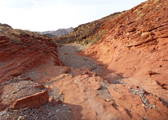 Pebbles and red bedrock