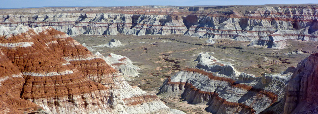 Banded hills at the edge of Ha Ho No Geh Canyon