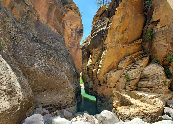 Cliffs above a long pool