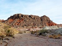 Grey and red hill