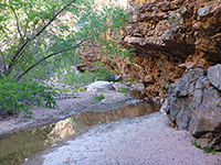 Stream past red rocks