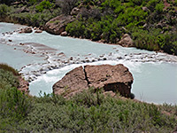 Boulder and travertine