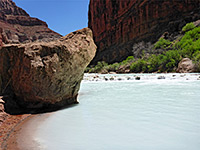 Boulder beside the river