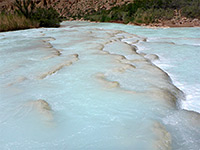 Travertine dams