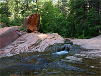 Boulder and cascade