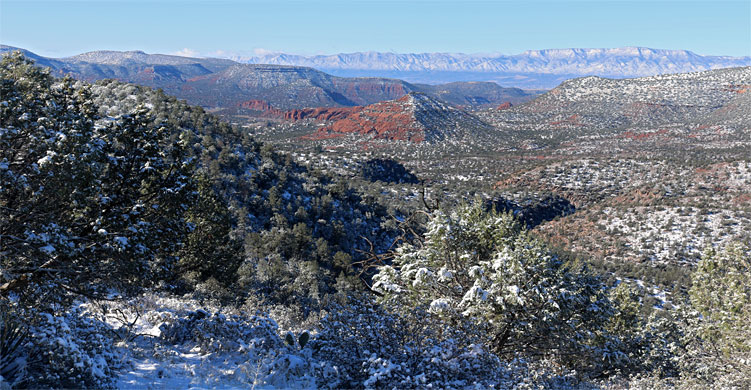 Mesas to the west, and the Black Hills on the horizon