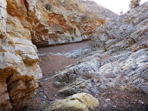 Narrow passageway through layered limestone