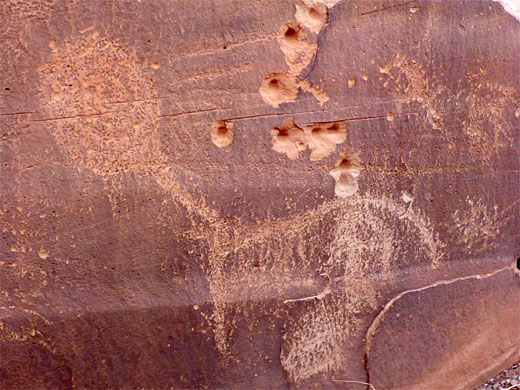 Petroglyph and bullet holes