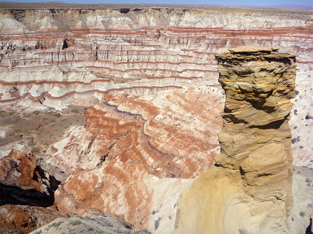 Badlands and a yellow pinnacle