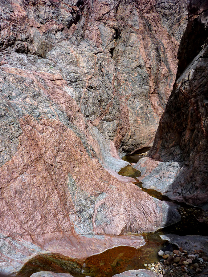 Water flowing over bare rock