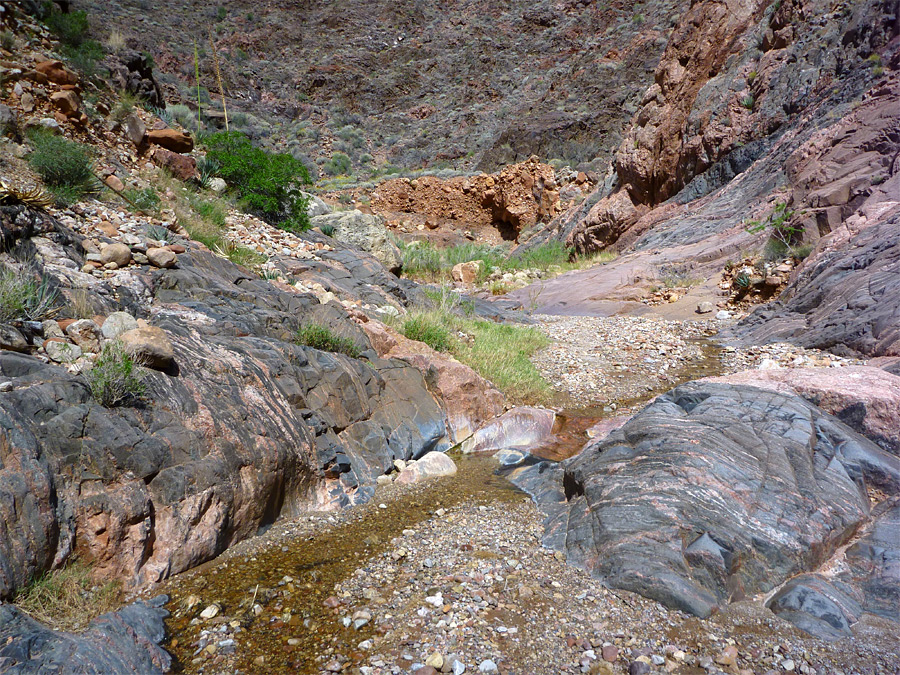 Stream over pink and grey schist