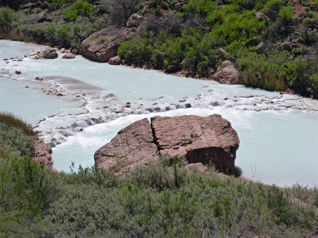 Boulder and travertine