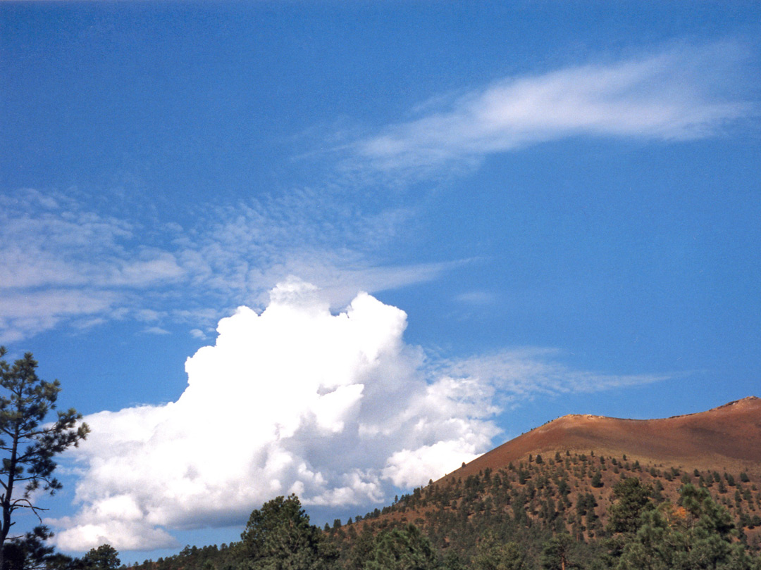 Thundercloud above a cinder cone