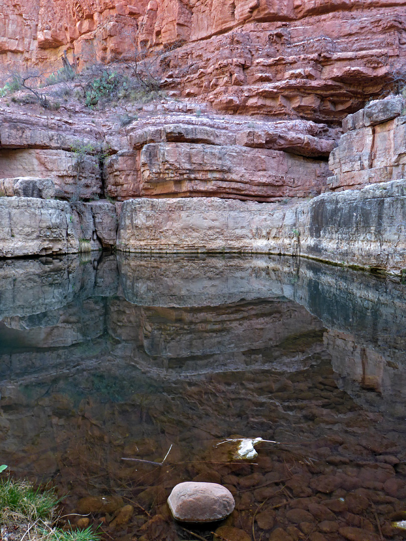 Layered, reddish cliffs