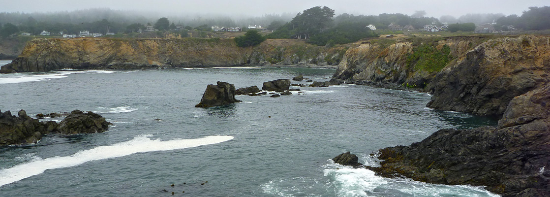 Rocks along the north side of the peninsula, on a foggy day