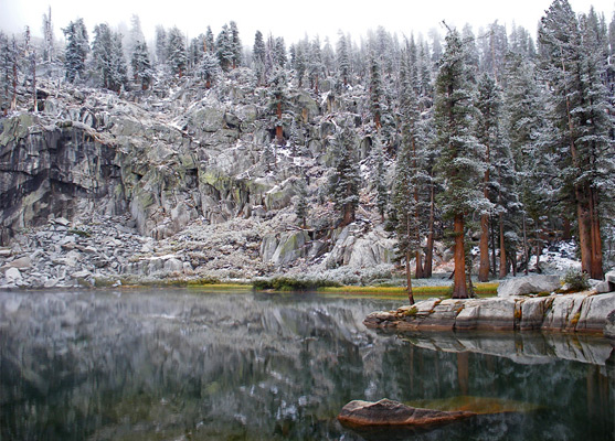 Reflections of granite cliffs on Heather Lake