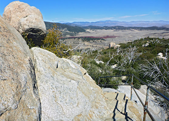 Railings and slickrock at the summit of Stonewall Peak