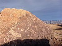 Elk, comb and circle petroglyphs