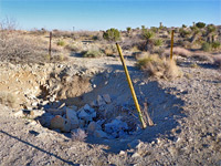 Covered mine shaft