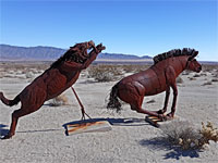 Sabertooth cat, and horse