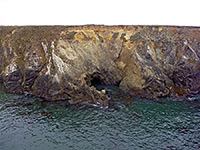 Cliffs around a cave