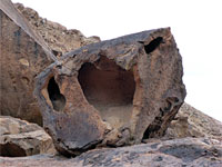 Partially hollow boulder