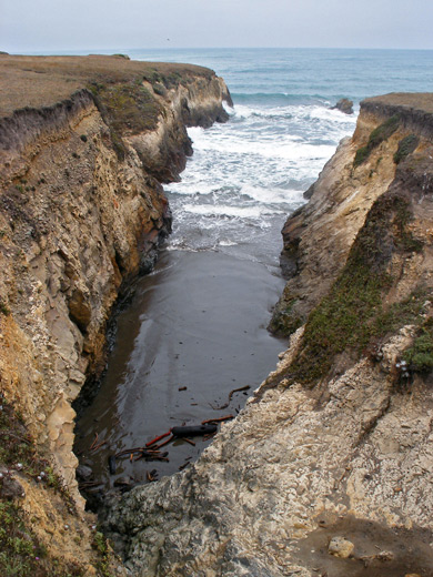 Inaccessible sandy cove at Point Arena