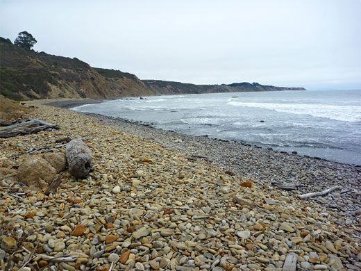 Pebbles and driftwood on Palomarin Beach