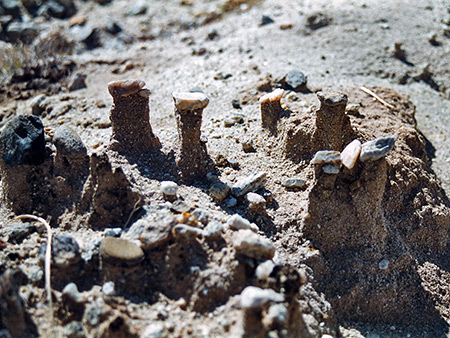 Pebbles on eroded sand