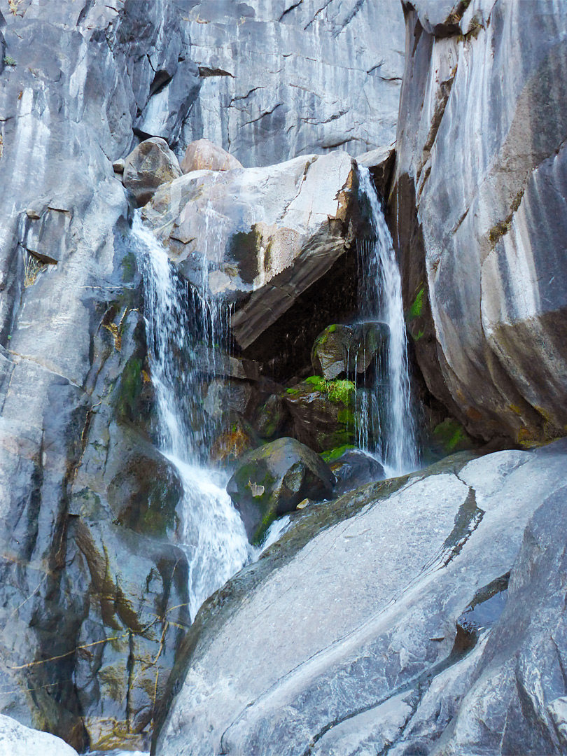 Boulder and waterfall