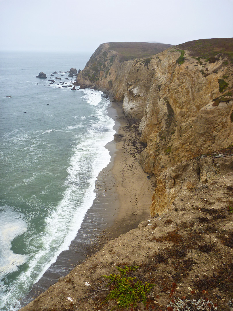 Narrow, inaccessible beach