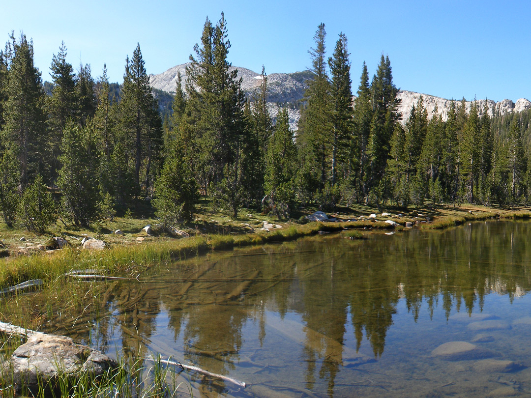 Edge of the lake; view towards Johnson Peak