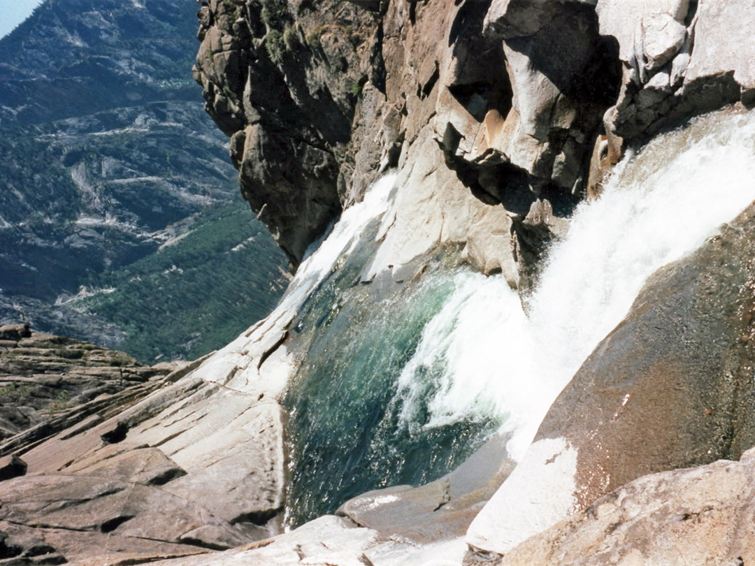 Directly above the upper fall