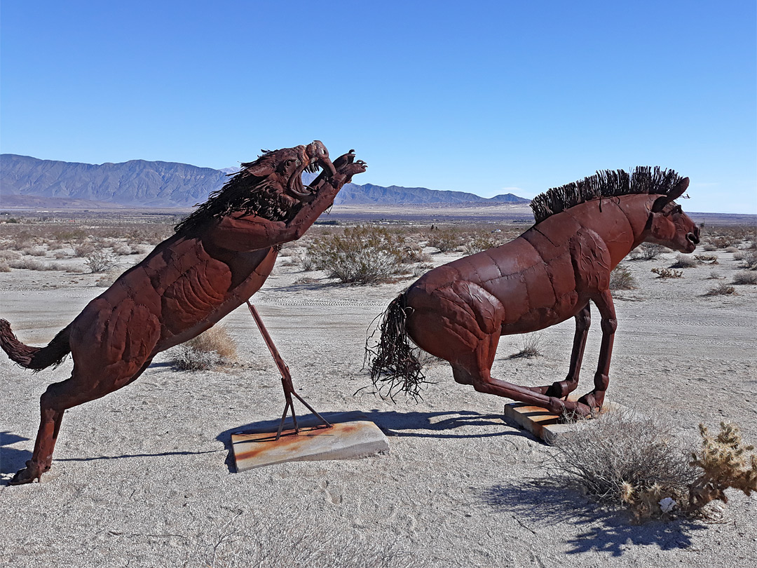 Sabertooth cat, and horse